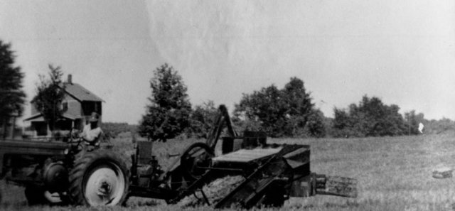 John Deere tractor and baler about 1948